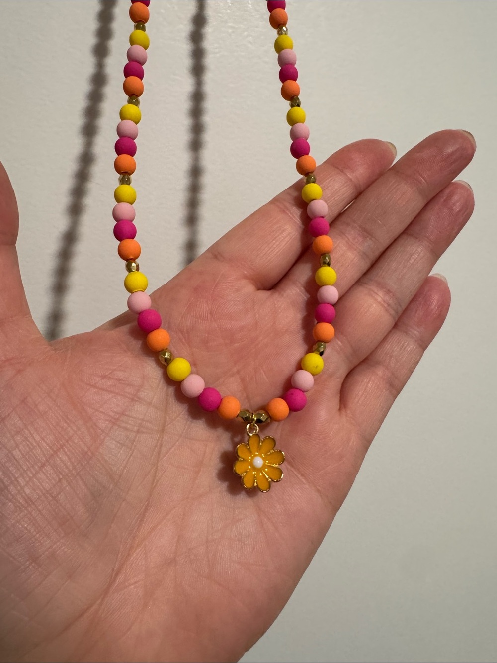 Playful Multicolor Beaded Necklace with Yellow Daisy Pendant